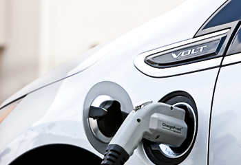 A photo of EV Charging plug plugged into a Chevy Volt EV